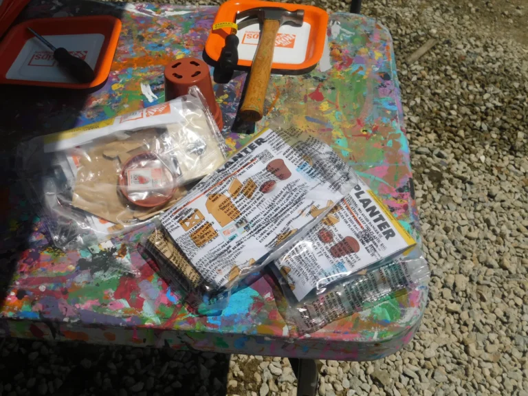Woodworking kits and tools set out for the children's workshop